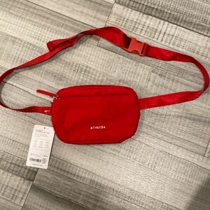 NWT athleta crossbody belt bag- red clover berry